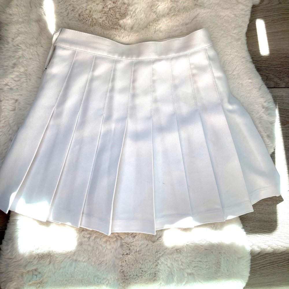 American Apparel white tennis skirt in small with stain